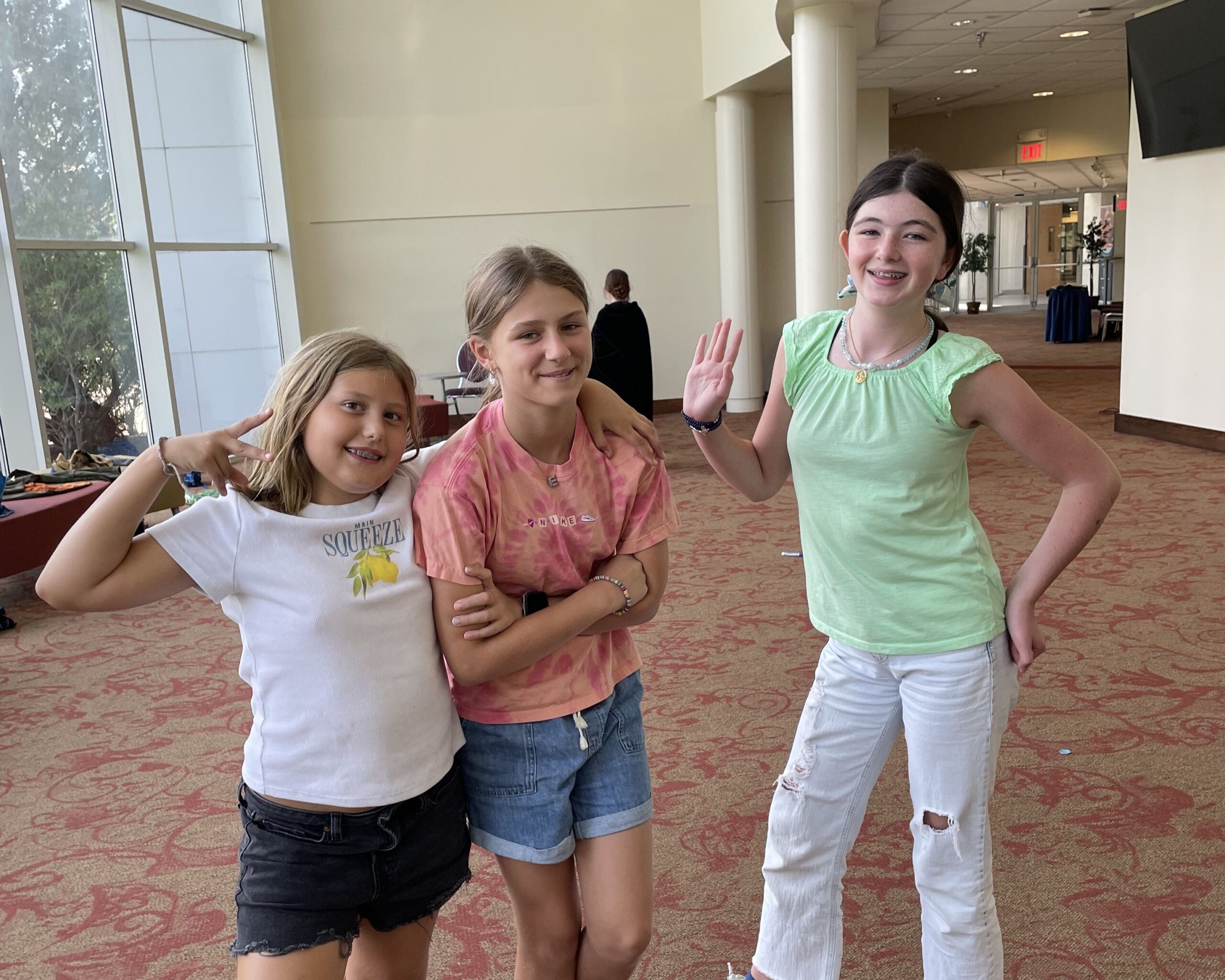 theater summer camp participants pose together during their comedy and improv session