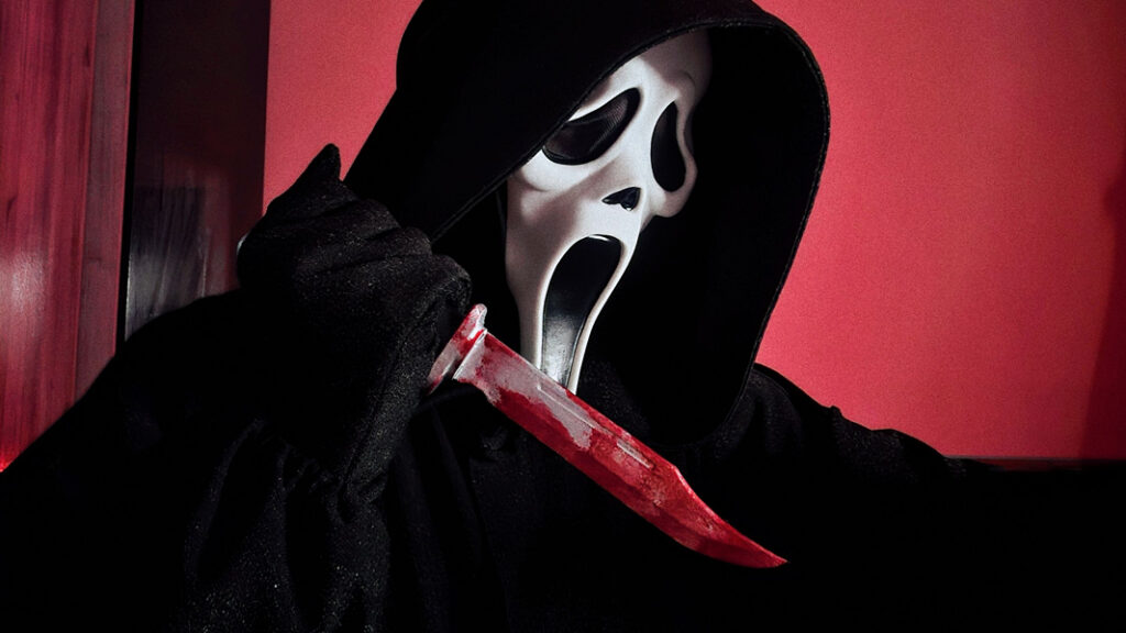 hooded character wearing a white mask as seen in the film Scream showing in an interactive movie night