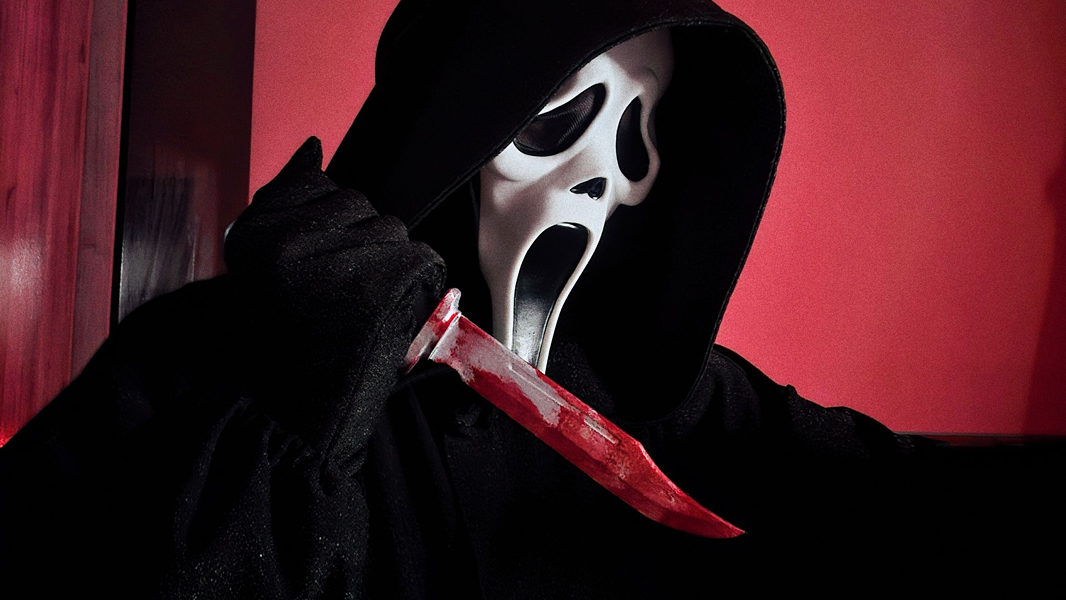 hooded character wearing a white mask as seen in the film Scream showing in an interactive movie night